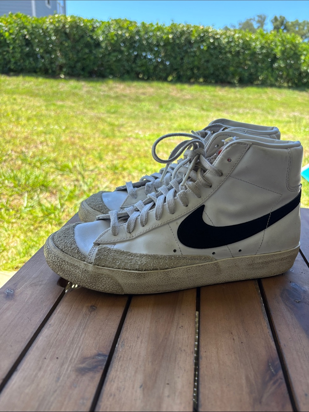 Nike White High-Top Sneakers with Black Swoosh and Suede Accents